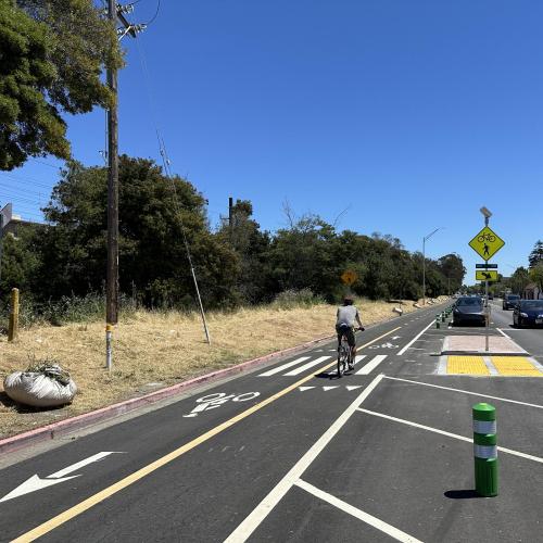 Bicyclists in two-way separated bikeway in Burlingame, CA